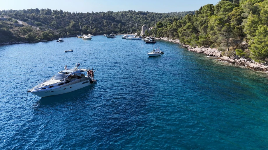 Private Yacht Hire Miracul 40 Silver – Elegant Side View with Calm Waters